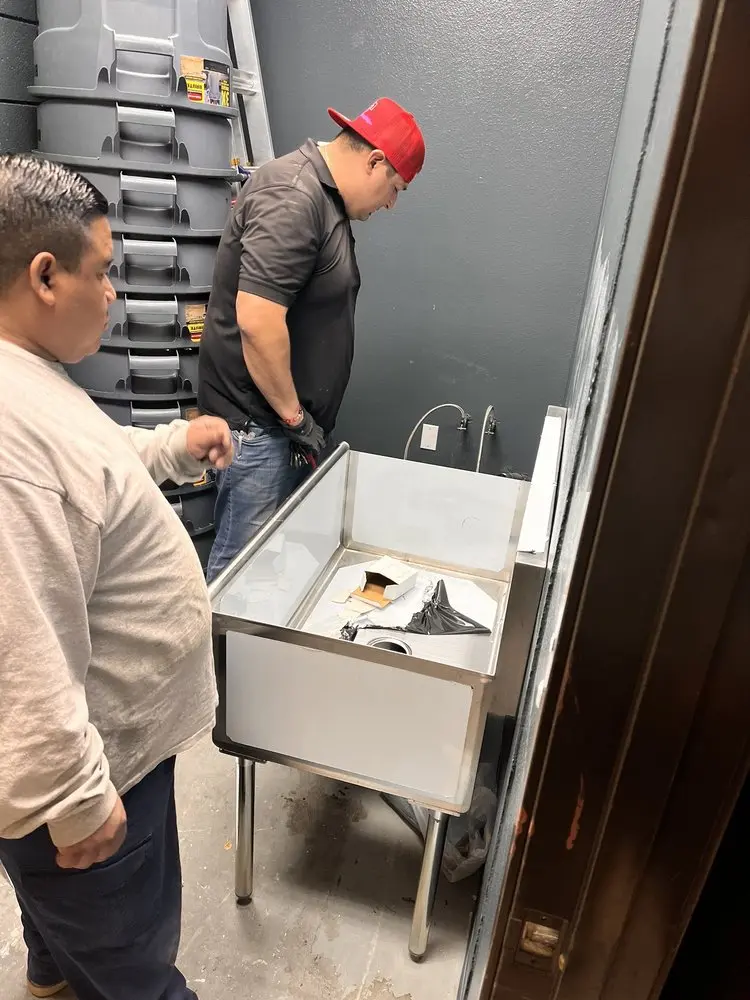 Commercial plumbing and sink installation in Doris